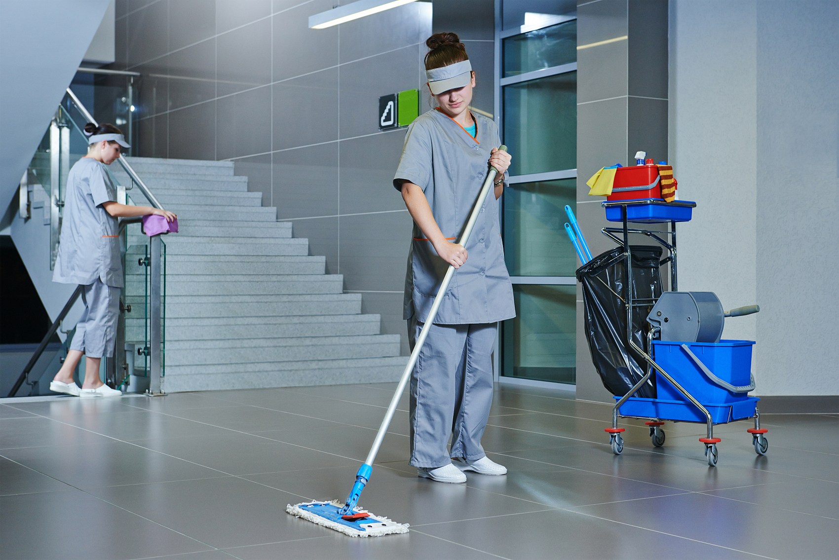 worker cleaning floor with machine.jpg